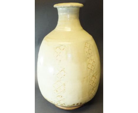 A Phil Rogers vase, ash glazed with hatched or latticework panelled decoration, 44.5 cm high