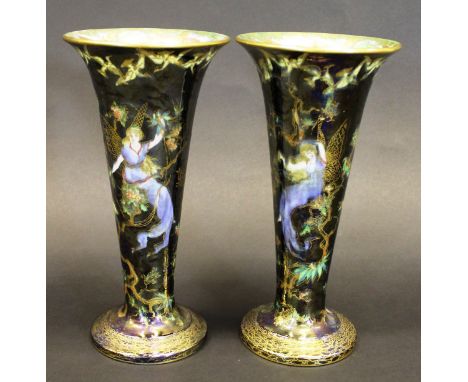 A pair of Wedgwood Fairyland Lustre trumpet vases, designed by Daisy Makeig-Jones "Butterfly Woman", printed and painted in c