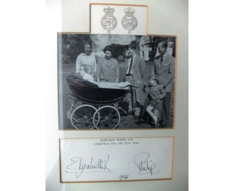 A framed and glazed black and white image of the Royal Family with infant Prince Edward in pram adapted from the 1965 Christm