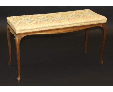A Victorian rosewood framed dressing stool with upholstered top on cabriole legs, bearing label "James Shoolbred & Co., Totte