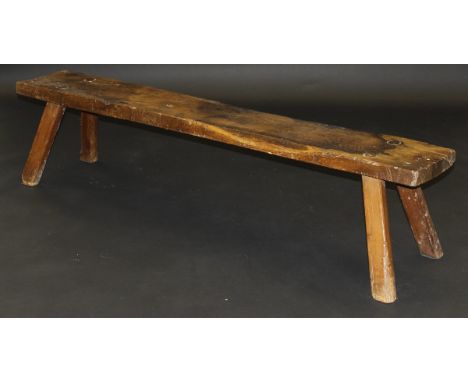 A 19th Century oak pig bench on four splayed supports, 178 cm x 44 cm