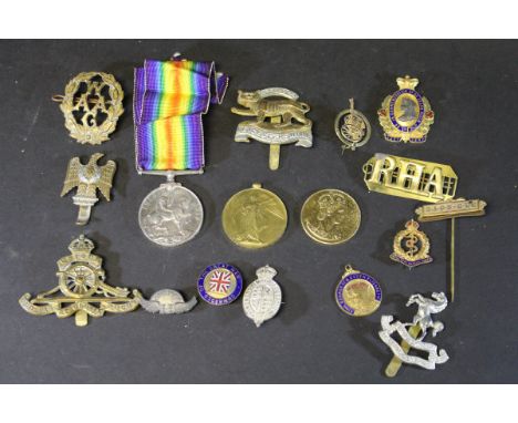 A quantity of various military badges, war medal, victory medal awarded to "WKR F R PITTMAN OMAAC", Queen Elizabeth II 1953 C