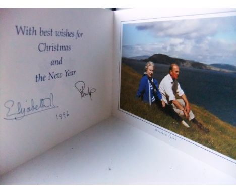 A Christmas card from Her Majesty The Queen and Prince Philip depicting The Queen and Prince Philip at the Races 1992 signed 