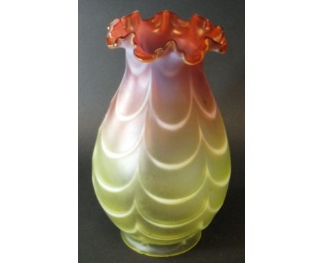 A cranberry and vaseline glass oil lamp shade with swagged decoration, 26 cm high