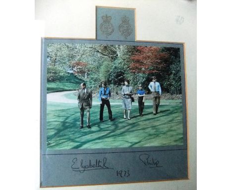 A framed and glazed image of the Royal Family adapted from the 1971 Christmas card signed (probably autopen) "Elizabeth R" an