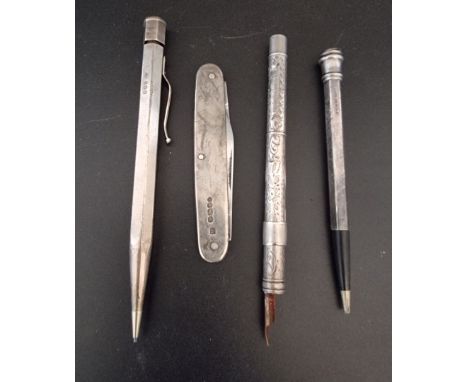 An engine turned silver propelling pencil, London 1946, 12cm; together with another propelling pencil, stamped sterling; a Vi