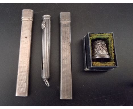 A silver propelling pencil holder, by&nbsp;Perry &amp; Co Ltd, Birmingham 1899, 7cm; together with two engine turned silver c