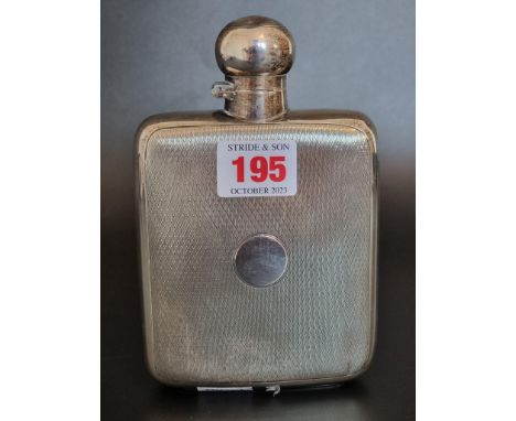 An engine turned silver hip flask, Sheffield 1925, 15.5cm high, 218g. 