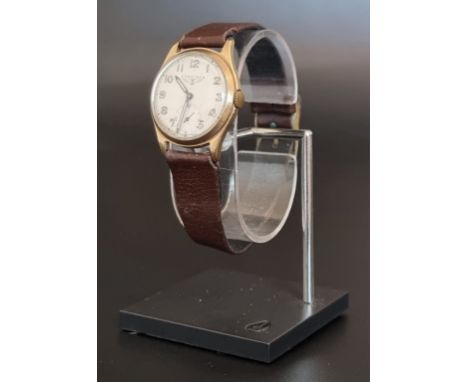 A circa 1947 Longines 9ct gold manual wind wristwatch, 30mm, Serial No.7345198, on leather strap. 