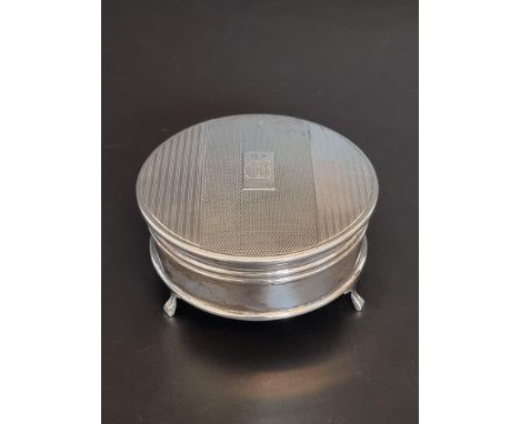 An engine&nbsp;turned silver jewellery box, Birmingham 1966, 8.5cm diameter. 