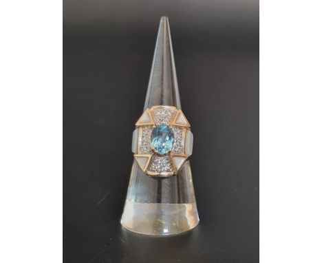 An Erte Art Deco style aquamarine, diamond and mother-of-pearl ring, signed and stamped 14k, size N. 