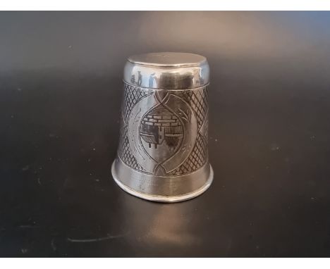 A Russian niello vodka cup, dated 1867, 4.9cm high.