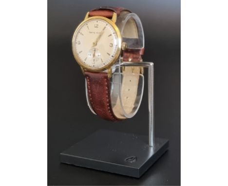 A vintage Smiths Astral gold plated wristwatch, 34mm, on a replacement leather strap. 