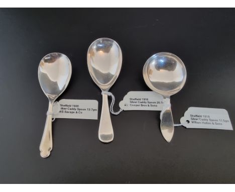 Three silver caddy spoons, Sheffield 1916, 1918 and 1930, total weight 46g. 