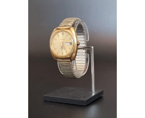 A vintage Garrard gold plated automatic wristwatch, 35mm, with engraved presentation from Leyland Cars, on a later expanding 