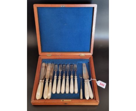 A cased set of six pairs of Victorian silver and mother of pearl dessert knives and forks, Sheffield 1868; together with a si