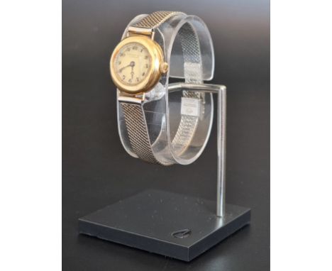 A Tiffany &amp; Co 18ct gold manual wind ladies wristwatch, 25mm, having Swiss movement, import mark London 1915, on a later 
