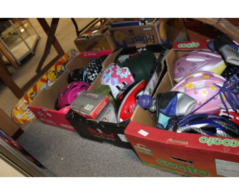 THREE TRAYS OF HELMETS, ROLLER SKATES, SKATE BOARDS ETC