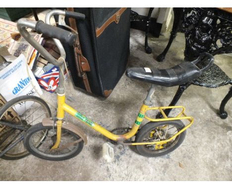 A VINTAGE YELLOW LITTLE PRINCE CHILDS CHOPPER BIKE
