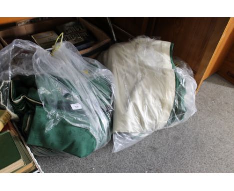 TWO BAGS OF GREEN CURTAINS