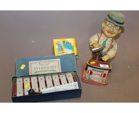 A CHARLEY WEAVER BAR TENDER MODEL + A VINTAGE XYLOPHONE + A RINGING TRICYCLE