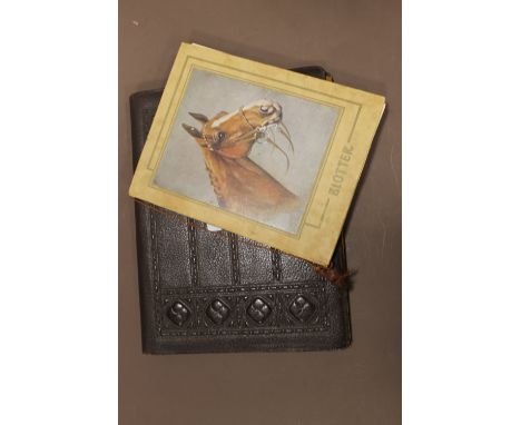 A VINTAGE BLOTTER BOOK IN FOLDER