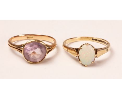 Rose gold ring set with an amethyst stamped 9ct and an opal ring hallmarked 9ct   Condition Report   Click here for further i