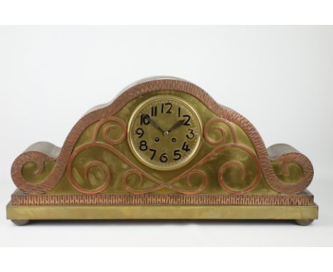 Late 19th century large brass mantel clock, shaped top, with tooled copper scroll work, W69cm, H33cm   Condition Report   Cli