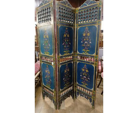 A painted Moroccan four panel screen, each panel 186 x 45 cm