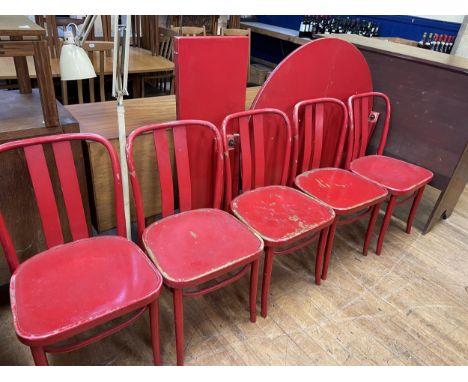 A set of six painted red Bentwood dining chairs, and an extending dining table, 110 cm diameterBarn stored, cannot get legs b