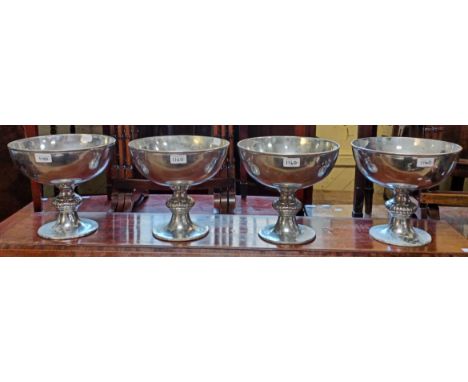 A set of four chrome plated pedestal bowls, 27 cm diameter (4)