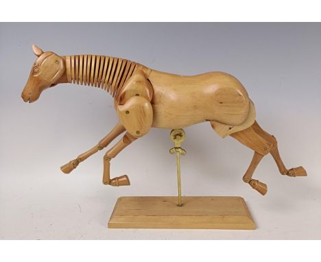 An artists wooden articulated/lay horse, on a stand, 36 cm wide