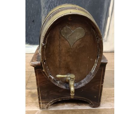 A late 19th/early 20th century Continental brass bound barrel on stand, 33 cm wide