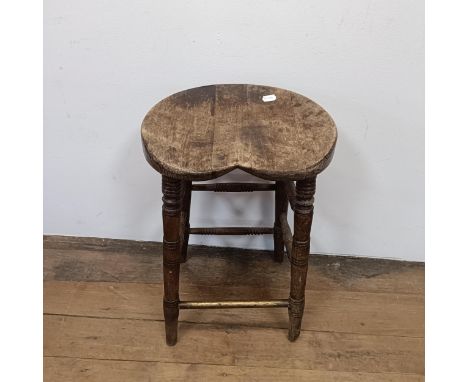 A stool, with a shaped seat, on turned legs, 66 cm high