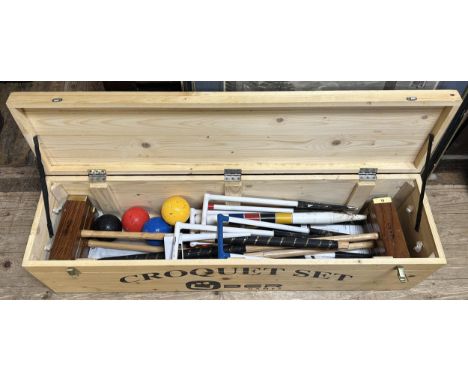 A Uber Games croquet set, casedObvious signs of use with some scuffs and general wear and tear, but overall in generally good