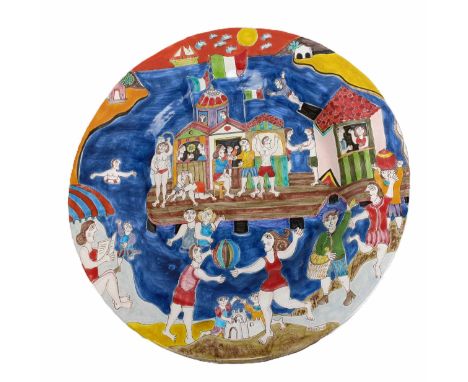 A large Italian Giovanni DeSimone maiolica pottery charger, decorated figures by beach huts, 50.5 cm diameter