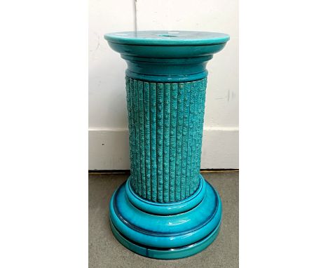 A Burmantofts blue glazed jardinière stand, 60 cm high x 33 cm wideimpressed marks