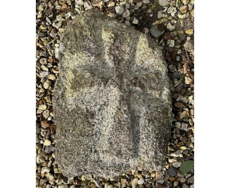 A granite stone, carved with a crossage unknown, came from a house clearance, 45 cm x 36 cm