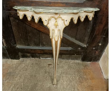 A painted console table, label verso, reading Made In Italy