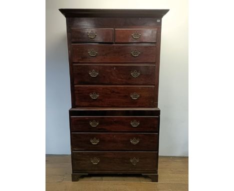 A mahogany chest on chest, the top having two short and three long drawers, on a base with three long drawers, 110 cm wide