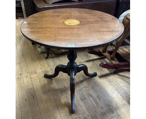 A mahogany tilt top table, on a tripod base, 82 cm diameter