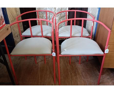 A set of four Terence Conran for Habitat painted metal Bieffeplast tub chairs (4)Some losses/scuffs to the red paintwork, mor