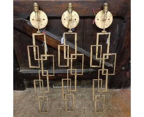 A set of three 20th century gilt metal wall lights, 80 cm (3)