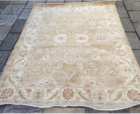 A machine made cream ground carpet, 250 x 190 cm