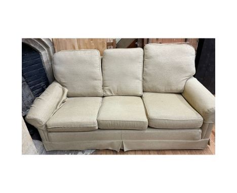 A yellow three seater sofa, and assorted other furniture