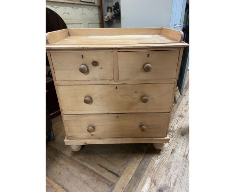 A pine chest, having a galleried top, with two short and two long drawers, 82 cm wide