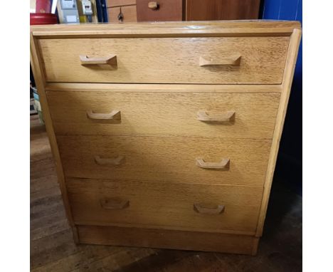 An oak utility secretaire chest, having a fitted drawer above four other drawers, 82 cm wide