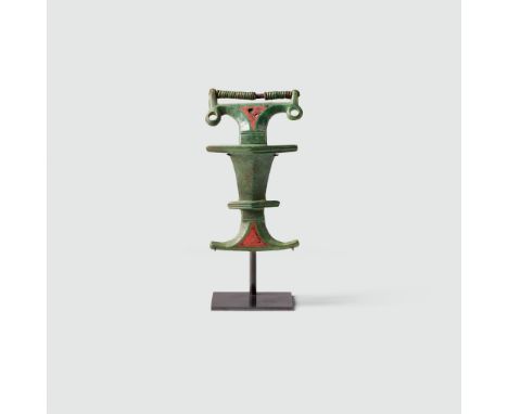 KIEV CULTURE BROOCH EASTERN EUROPE, C. 200 - 500 A.D. bronze and enamel, long central bow with a series of horizontal lug pro