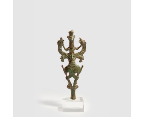 LURISTAN MASTER OF BEASTS STAFF FINIAL NEAR EAST, EARLY FIRST MILLENNIUM cast bronze, the hollow tubular shaft with two bejew