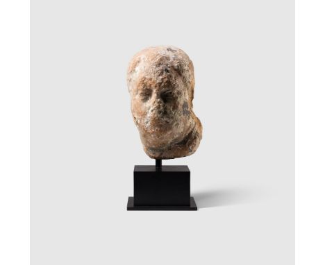 OVER LIFE-SIZE BUST OF VITELLIUS EUROPE, MID 1ST CENTURY A.D. carved stone, shown gazing over the left shoulder, marine inclu